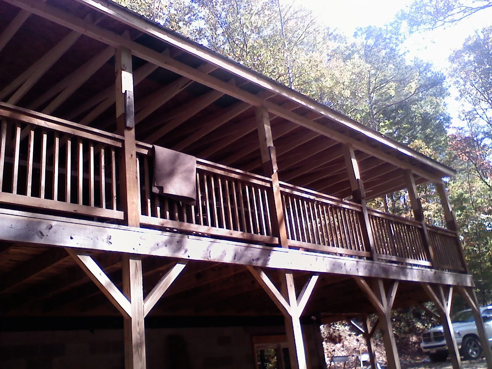 Timber framing under a new elevated porch and deck — Roof Leak Repair in Leadore by Roofing Brothers